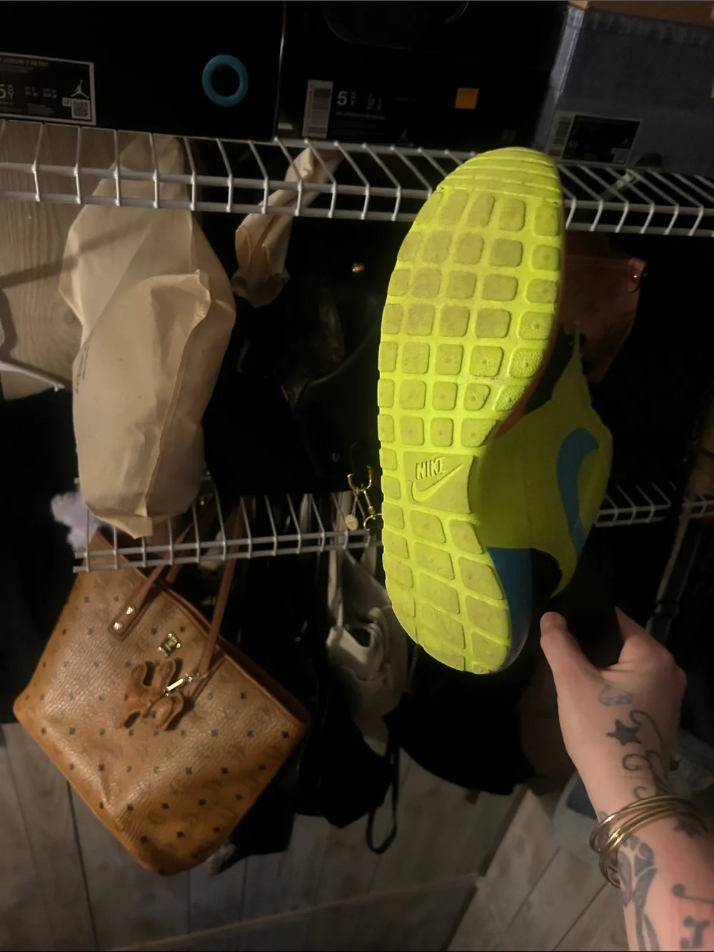 Nike Black Sneakers with Blue, Yellow and Pink Sole Accents